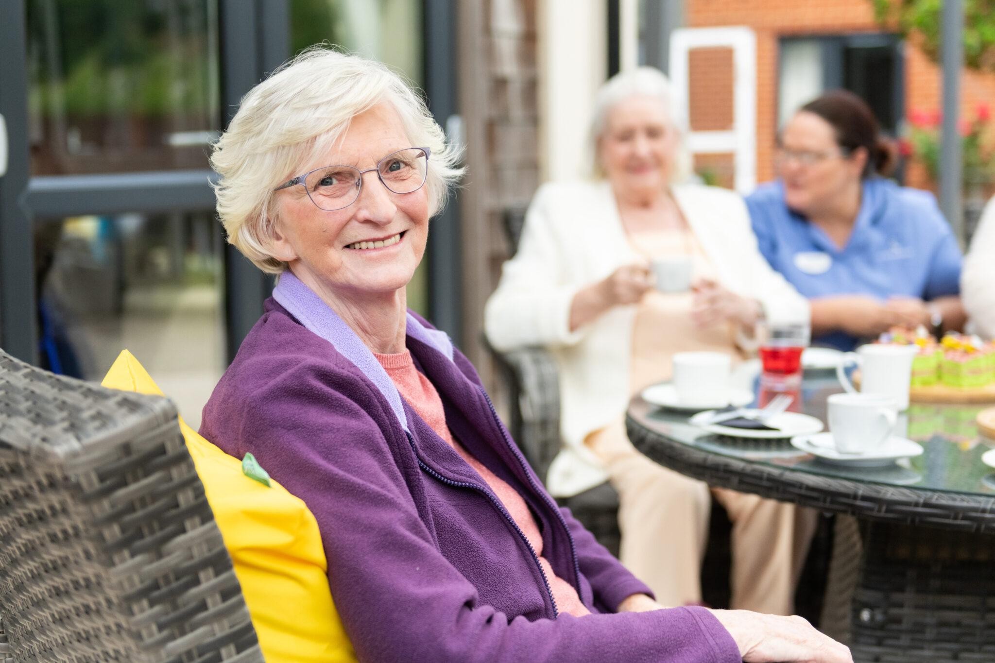 Enjoying the outdoors and Landscaped gardens at Abbotswood Court care home in Romsey
