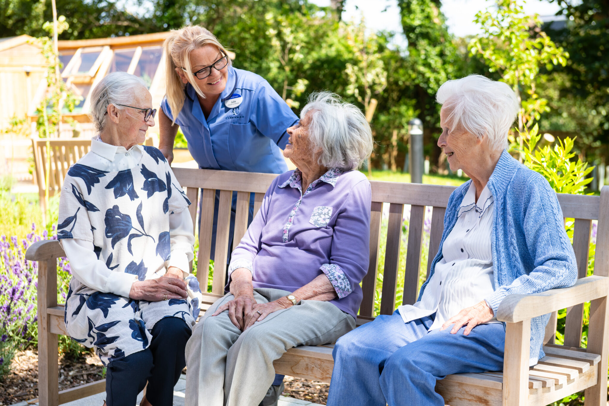 residentis socialising in the picturesque gardens Cinnamon Care Collection 2